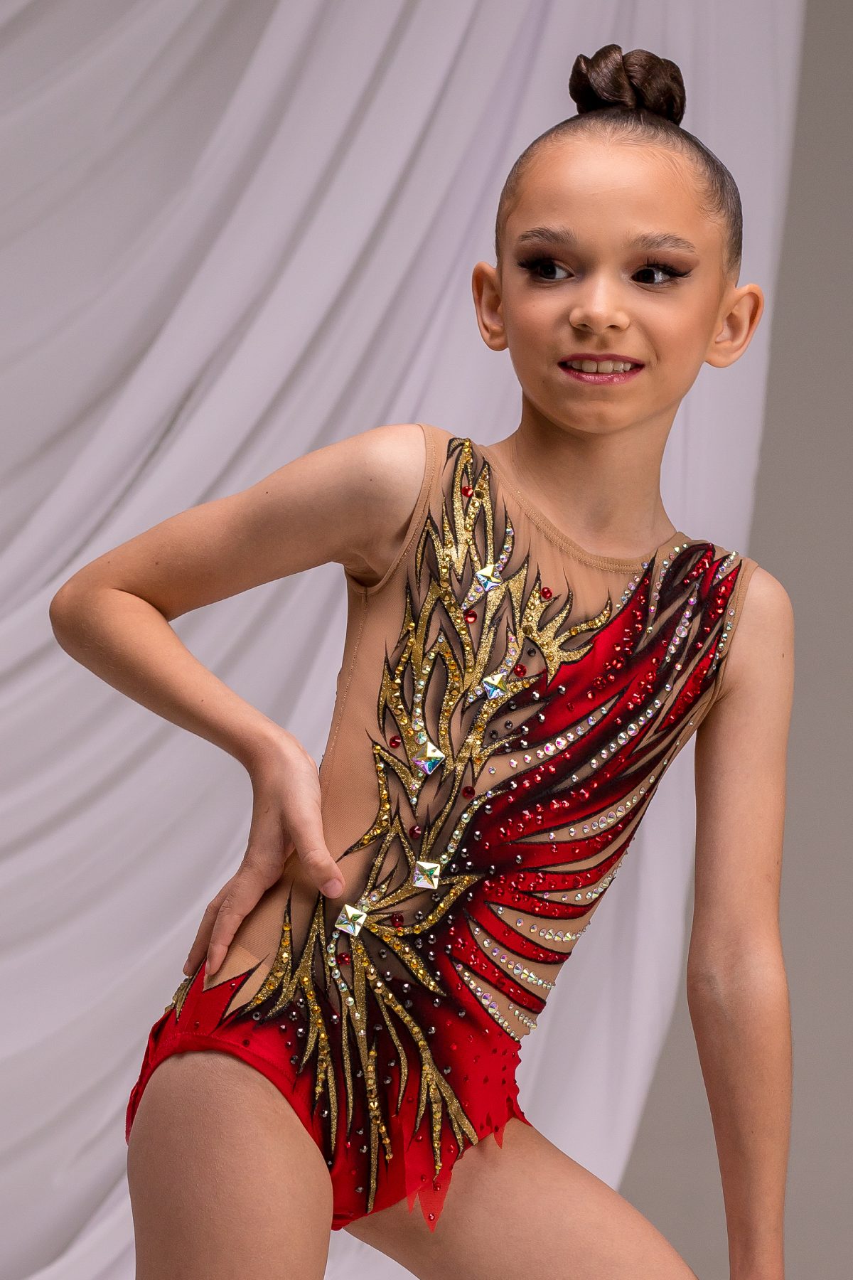 Купальник для художественной гимнастики Искры золота Red со стразами