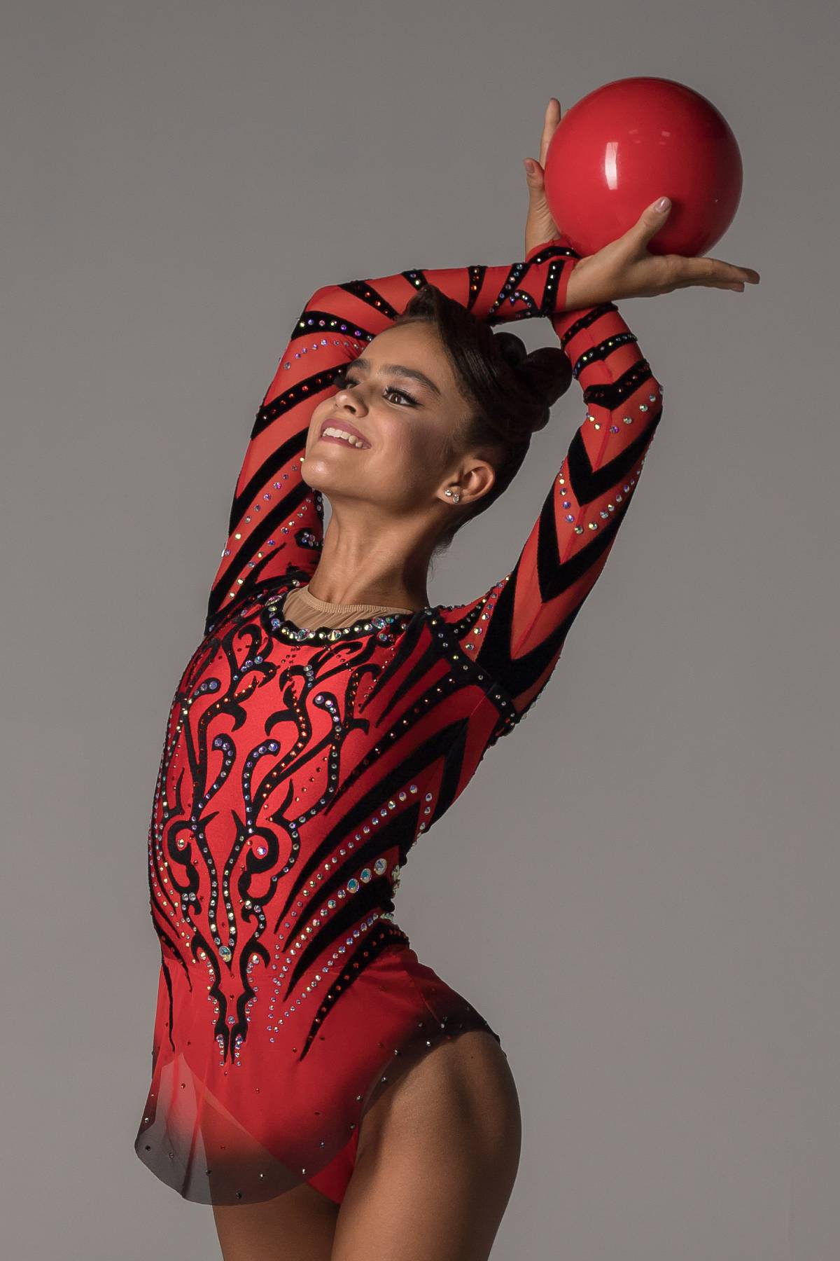 Купальник для художественной гимнастики Королева Пламени с юбкой со стразами